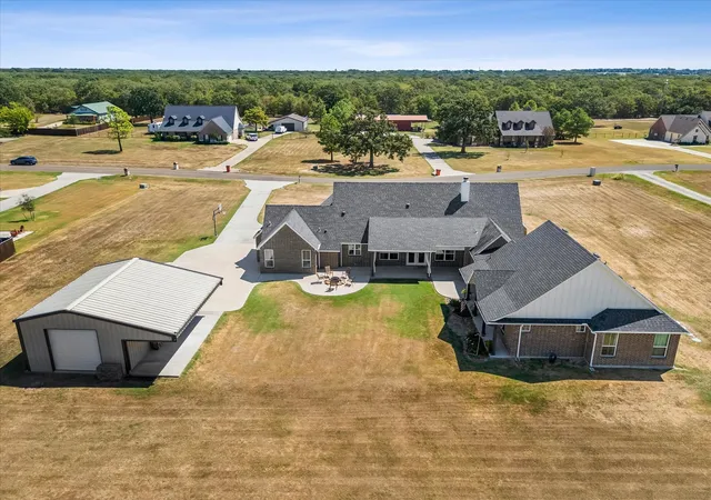 Photo 2 of Single family home for sale at 6120 Hidden Oaks Dr, Quinlan, TX 75474 | MLS# 21382777 | Listing updated on 2026-09-13