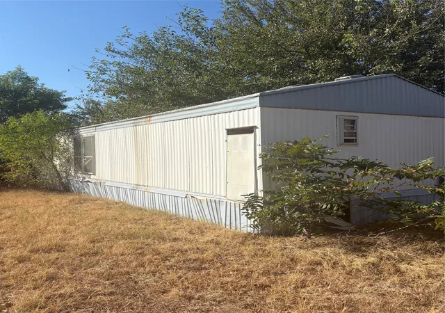 Photo 1 of Manufactured home for sale at 1026 Yucca St, Burkburnett, TX 76354 | MLS# 21384972 | Listing updated on 2026-10-02