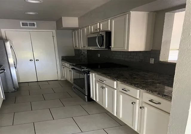 Photo 3 of Condo for sale at 9801 Royal Ln #104 Bldg. E, Dallas, TX 75231 | MLS# 21385950 | Listing updated on 2026-10-07