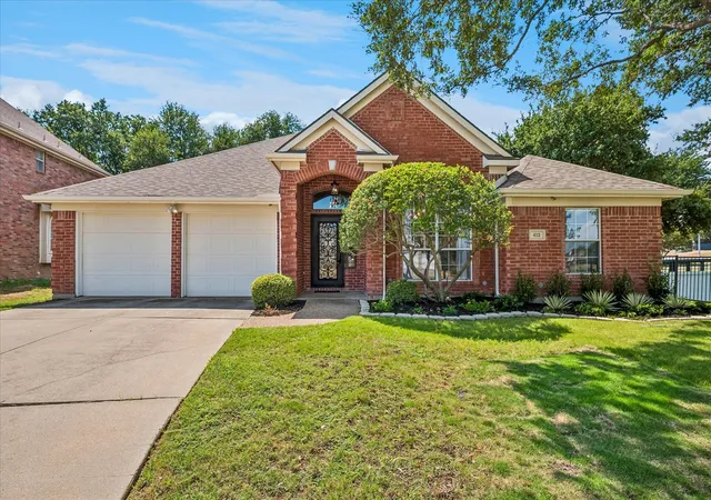 Photo 1 of Single family home for sale at 412 Manders Ct, Irving, TX 75063 | MLS# 21389882 | Listing updated on 2026-10-19