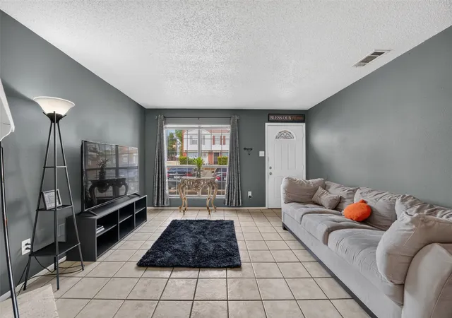 Listing Photo 1 - Condo for sale in building located at 10500 Lake June Rd, Dallas, TX 75217 - Unit #L07