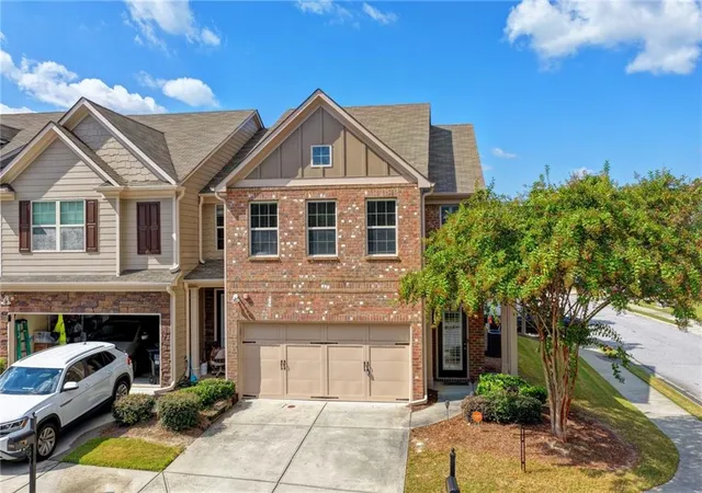 Photo 1 of Townhouse for sale at 2414 Attewood Dr, Buford, GA 30519 | MLS# 7840855 | Listing updated on 2026-09-26