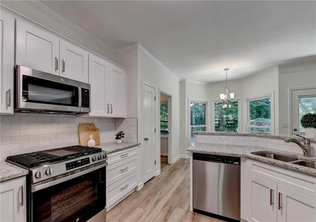 Photo 3 of Single family home for sale at 150 Ashewoode Downs Ln, Johns Creek, GA 30005 | MLS# 7797930 | Listing updated on 2026-09-17