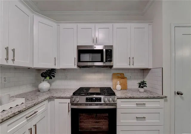 Photo 4 of Single family home for sale at 150 Ashewoode Downs Ln, Johns Creek, GA 30005 | MLS# 7797930 | Listing updated on 2026-09-17