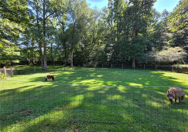 Photo 3 of Single family home for sale at 403 N Stringer Rd, Canton, GA 30115 | MLS# 7830129 | Listing updated on 2026-09-04