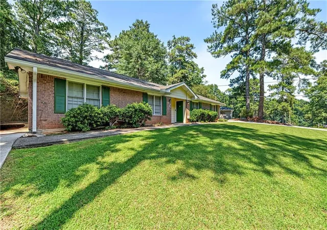 Photo 4 of House for sale at 4901 Valley Dale Dr SW, Lilburn, GA 30047 | MLS# 7841574 | Listing updated on 2026-09-25
