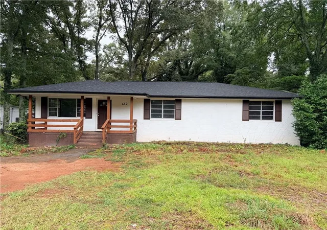 Photo 1 of Single family home for sale at 412 E Mcintosh Rd, Griffin, GA 30223 | MLS# 7836994 | Listing updated on 2026-10-02
