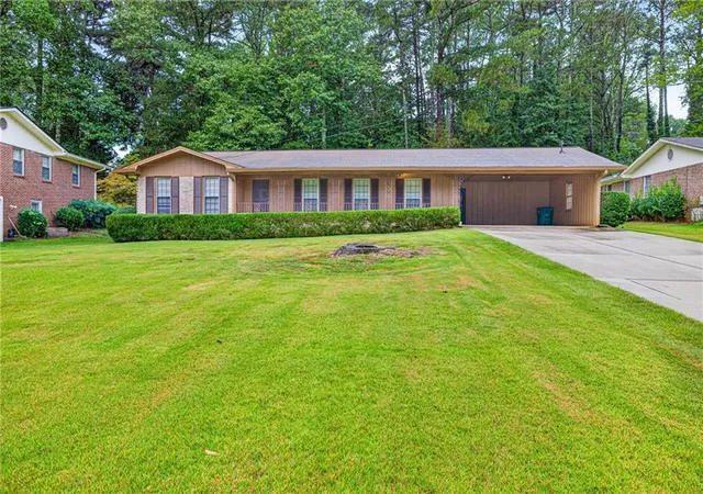 Photo 1 of Sale Pending at 513 Midland Park Dr, Stone Mountain, GA 30087 | MLS# 7823831 | Listing updated on 2026-10-10