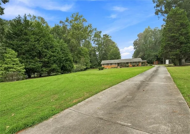Photo 2 of Sale Pending at 2633 Creek Ln Sw, Snellville, GA 30078 | MLS# 7829563 | Listing updated on 2026-09-19