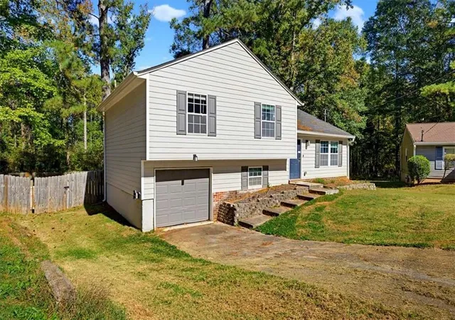 Photo 2 of Single family home for sale at 5817 Calico Ct, Lithonia, GA 30058 | MLS# 7860670 | Listing updated on 2026-10-29