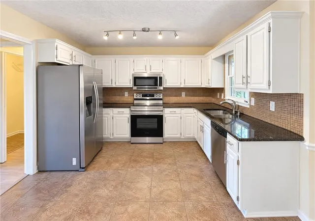 Photo 1 of Single family home for sale at 1454 Milford Ct S, Marietta, GA 30008 | MLS# 7860441 | Listing updated on 2026-10-29