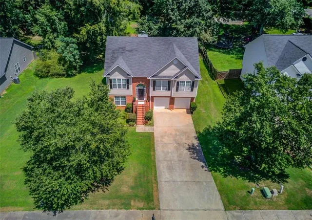 Photo 2 of Single family home for sale at 1143 Augustine Dr, Auburn, GA 30011 | MLS# 7831858 | Listing updated on 2026-09-06