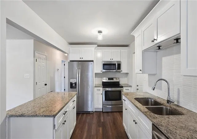 Photo 1 of Single family home for sale at 1410 Graymont Dr SW, Atlanta, GA 30310 | MLS# 7855886 | Listing updated on 2026-10-29
