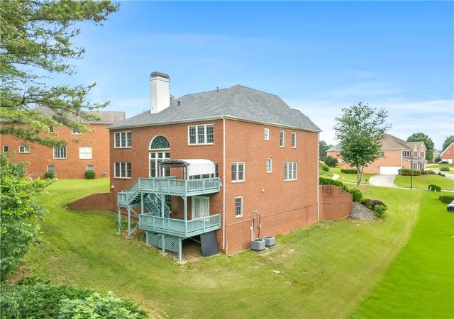 Photo 3 of Single family home for sale at 911 Masters Walk, Stone Mountain, GA 30087 | MLS# 7834282 | Listing updated on 2026-09-17