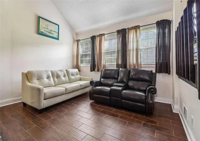 Photo 2 of Single family home for sale at 6265 Camp Rd, Riverdale, GA 30296 | MLS# 7841439 | Listing updated on 2026-09-24
