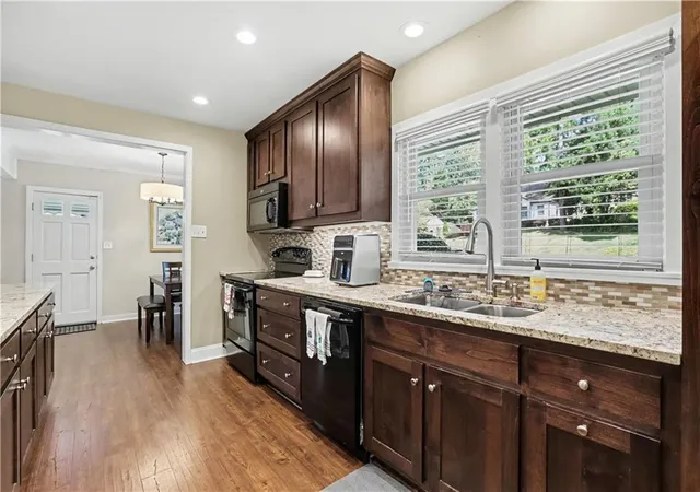 Photo 3 of Single family home for sale at 975 Cardova Dr Ne, Atlanta, GA 30324 | MLS# 7818469 | Listing updated on 2026-10-28