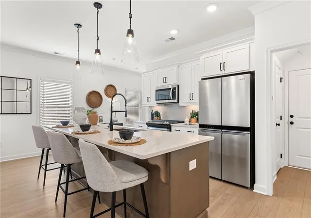 Photo 2 of Townhouse for sale at 694 Sunstone Ln, Lawrenceville, GA 30043 | MLS# 7835098 | Listing updated on 2026-09-19