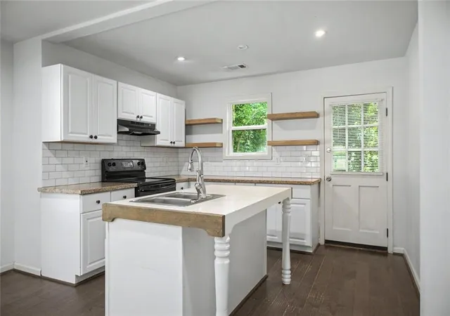 Photo 3 of Single family home for sale at 313 Walker Dr, Monroe, GA 30655 | MLS# 7836085 | Listing updated on 2026-09-11