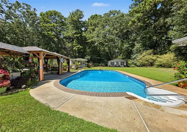 Photo 3 of Sale Pending at 4820 Brownsville Rd, Powder Springs, GA 30127 | MLS# 7837377 | Listing updated on 2026-09-28