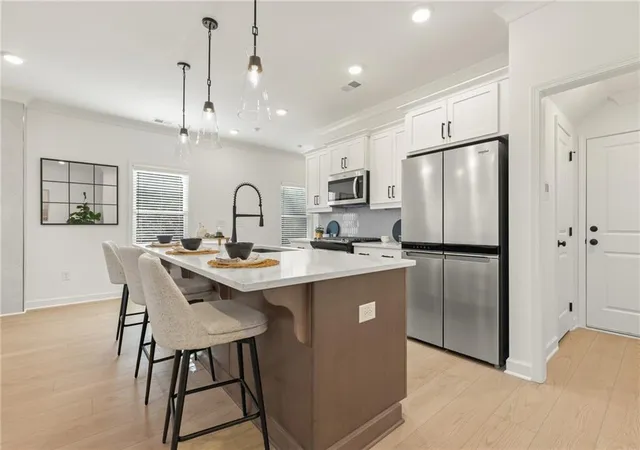Photo 3 of Townhouse for sale at 692 Sunstone Ln, Lawrenceville, GA 30043 | MLS# 7835063 | Listing updated on 2026-09-19