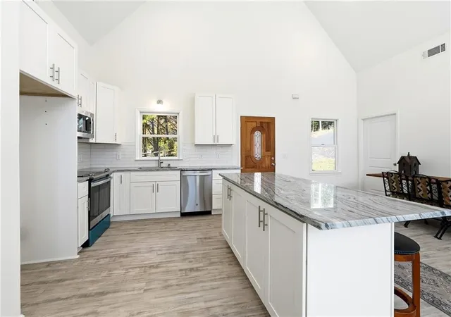 Photo 3 of Single family home for sale at 8155 Stone Hl Rd, Cumming, GA 30028 | MLS# 7832495 | Listing updated on 2026-09-16
