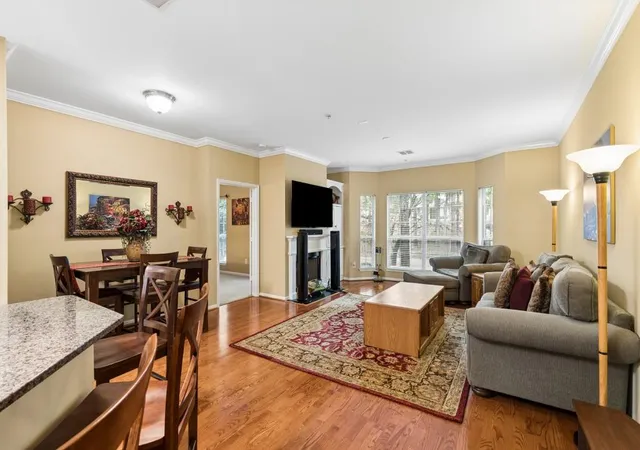 Listing Photo 1 - Condo for sale in building located at 5641 Roswell Rd, Atlanta, GA 30342 - Unit #217