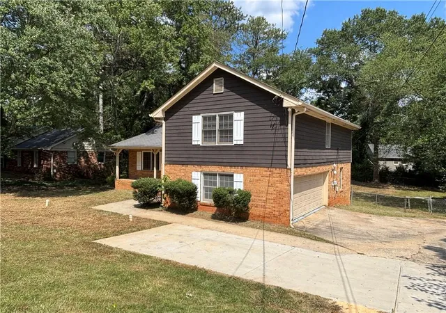 Photo 1 of Single family home for sale at 676 Killian Hl Rd Sw, Lilburn, GA 30047 | MLS# 7830182 | Listing updated on 2026-09-08