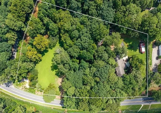 Photo 2 of Single family home for sale at 1921 Lilburn Stone Mountain Rd, Stone Mountain, GA 30087 | MLS# 7825059 | Listing updated on 2026-09-09