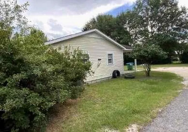 Photo 2 of Single family home for sale at 606 E Poplar St, Atmore, AL 36502 | MLS# 7835374 | Listing updated on 2026-09-11