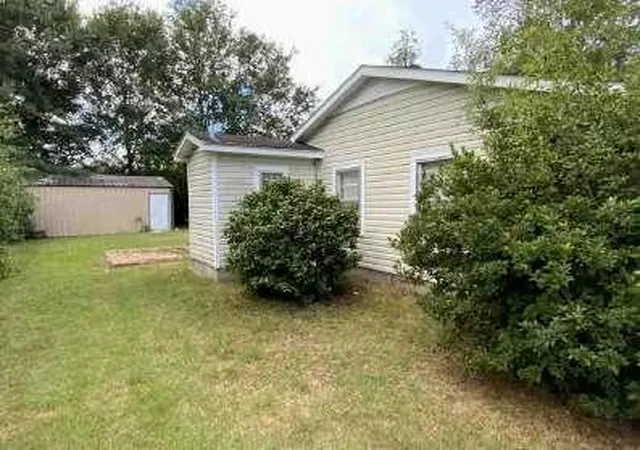 Photo 3 of Single family home for sale at 606 E Poplar St, Atmore, AL 36502 | MLS# 7835374 | Listing updated on 2026-09-11