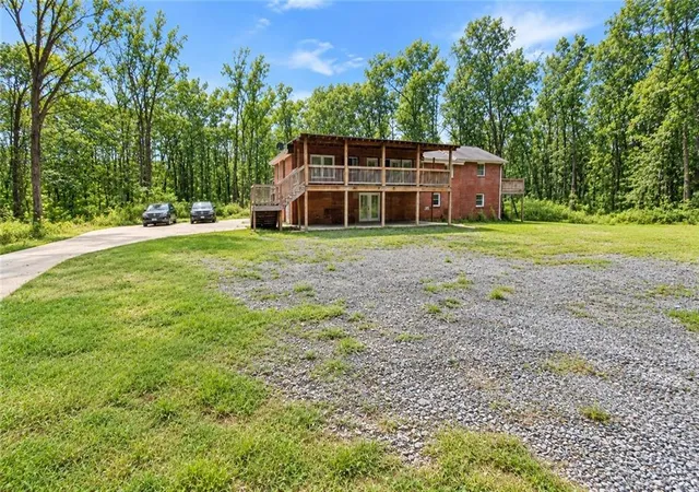 Photo 3 of Single family home for sale at 140 Joe Bray Rd, Fayetteville, GA 30214 | MLS# 7841940 | Listing updated on 2026-09-24