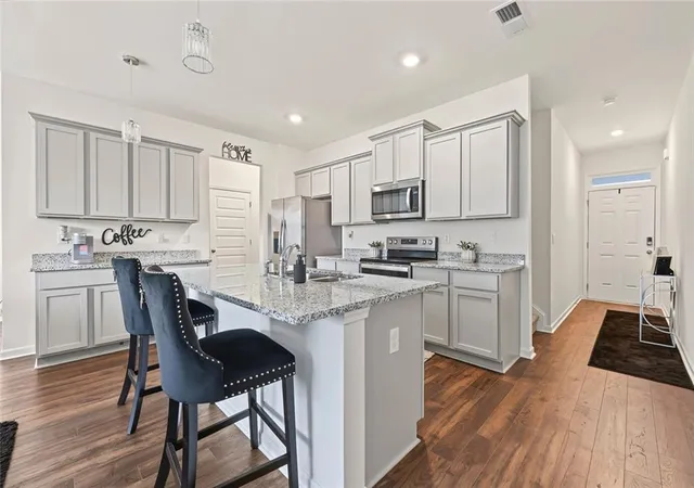 Photo 3 of Townhouse for sale at 102 Hampton Cir, Mcdonough, GA 30253 | MLS# 7844369 | Listing updated on 2026-09-26