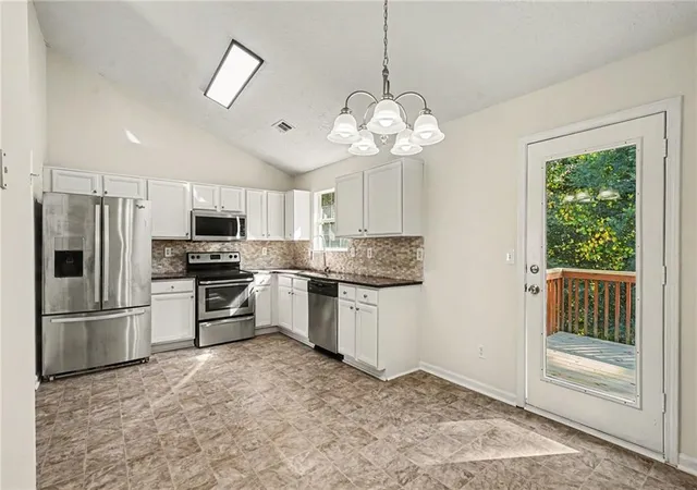 Photo 2 of Single family home for sale at 6451 Alford Cir, Lithonia, GA 30058 | MLS# 7860700 | Listing updated on 2026-10-29