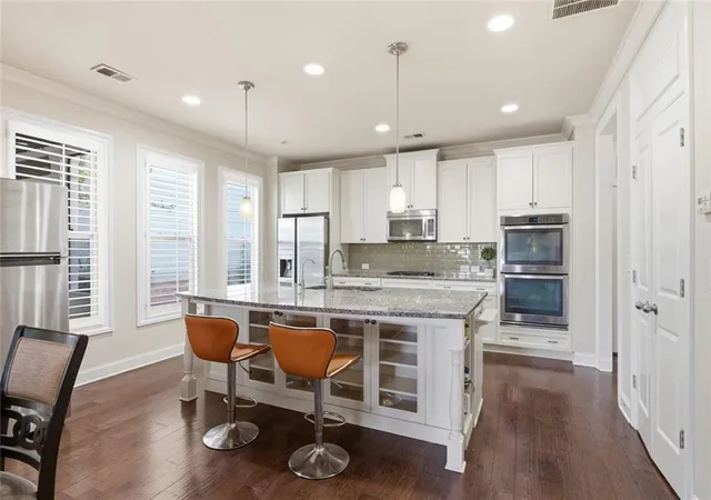 Photo 3 of Single family home for sale at 7565 Scarlet Dr, Alpharetta, GA 30005 | MLS# 7833224 | Listing updated on 2026-09-16