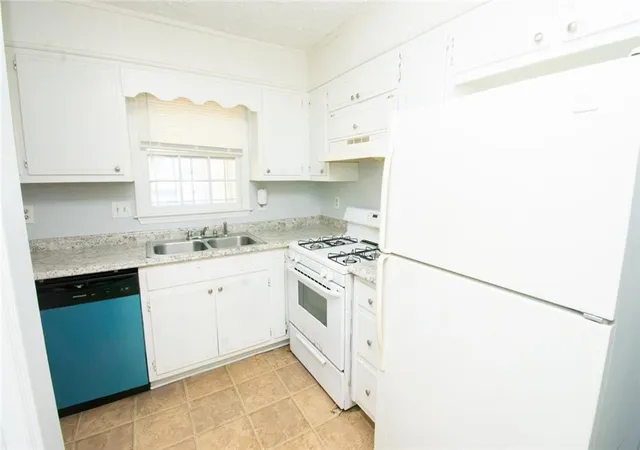 Photo 3 of Multi family home for sale at 6704 Chupp Rd, Lithonia, GA 30058 | MLS# 7839153 | Listing updated on 2026-09-17
