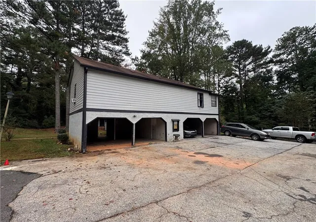 Photo 3 of Multi family home for sale at 1411 Stone Ml Tr, Stone Mountain, GA 30083 | MLS# 7835270 | Listing updated on 2026-09-11
