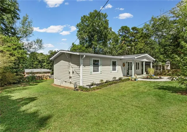 Photo 3 of Sale Pending at 2406 Woodland Dr Nw, Kennesaw, GA 30152 | MLS# 7836787 | Listing updated on 2026-10-04