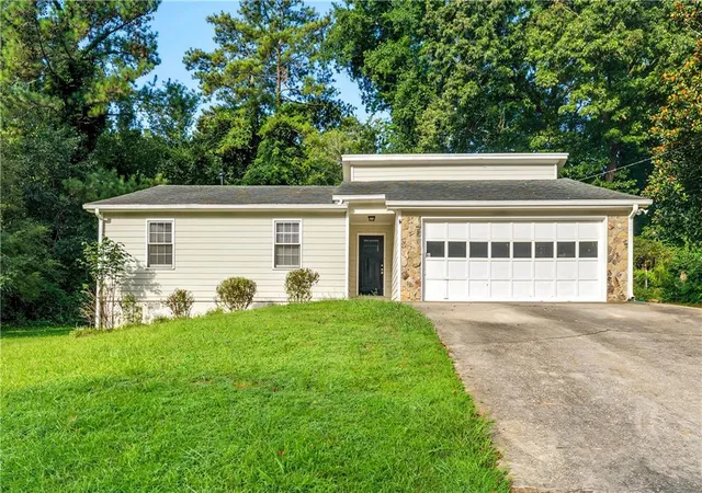 Single family home for sale at 654 Village Crk Dr SW, Lilburn, GA 30047 | MLS# 7832277