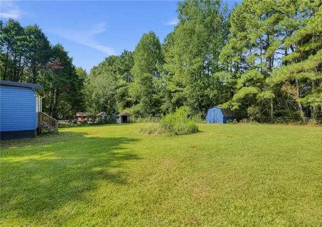 Photo 4 of Single family home for sale at 240 Norfolk Dr, Hampton, GA 30228 | MLS# 7843897 | Listing updated on 2026-09-29