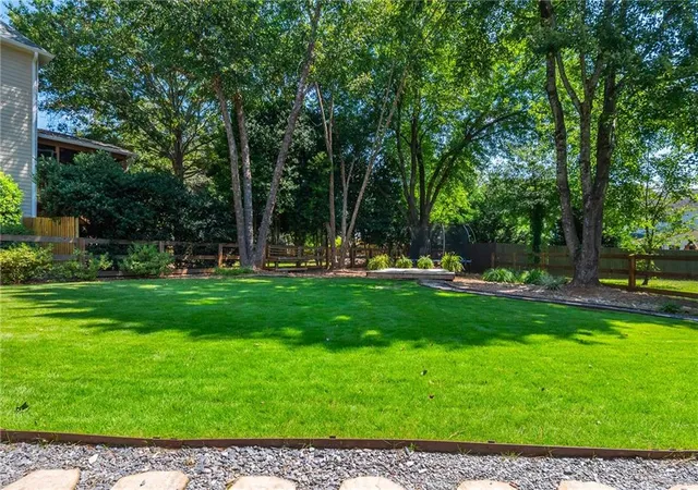 Photo 2 of Single family home for sale at 100 Cobblestone Way, Alpharetta, GA 30009 | MLS# 7833800 | Listing updated on 2026-09-10