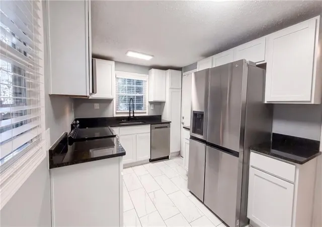 Photo 2 of Single family home for sale at 1411 Fulton Ave, Atlanta, GA 30344 | MLS# 7833412 | Listing updated on 2026-09-19