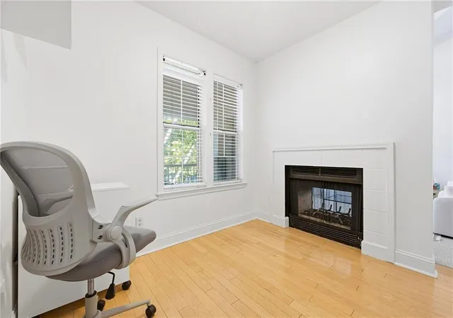 Listing Photo 1 - Condo for sale in building located at 240 Renaissance Pkwy Ne, Atlanta, GA 30308 - Unit #108