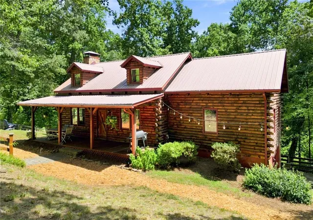 Photo 2 of Single family home for sale at 400 Foster Coltrane Ln, Ball Ground, GA 30107 | MLS# 7829692 | Listing updated on 2026-09-11