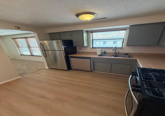 Listing Photo 1 - Condo for sale in building located at 1635 Mcnaughten Rd, Columbus, OH 43232 - Unit #B