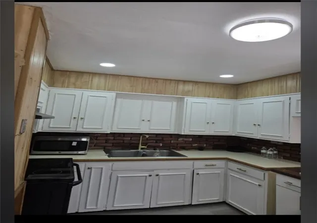 Photo 3 of Single family home for sale at 25 Wilson St, West Warwick, RI 02893 | MLS# 1412210 | Listing updated on 2026-09-05