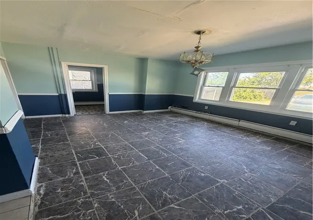 Photo 4 of Multi family home for sale at 54 Pearl St, Pawtucket, RI 02860 | MLS# 1415093 | Listing updated on 2026-10-06