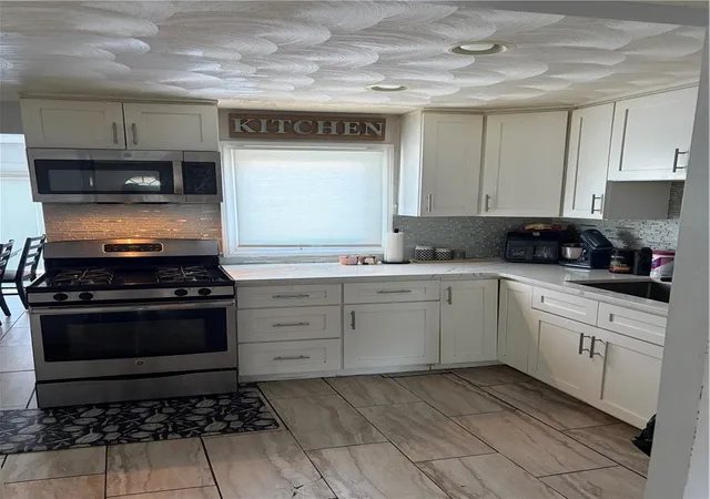 Photo 3 of Single family home for sale at 210 Pinecrest Dr, Pawtucket, RI 02861 | MLS# 1419226 | Listing updated on 2026-09-13