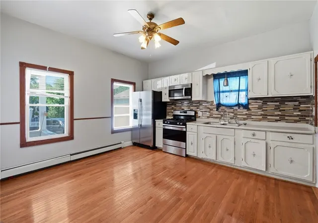 Photo 2 of Multi family home for sale at 55 Rebekah St, Woonsocket, RI 02895 | MLS# 1420020 | Listing updated on 2026-09-27