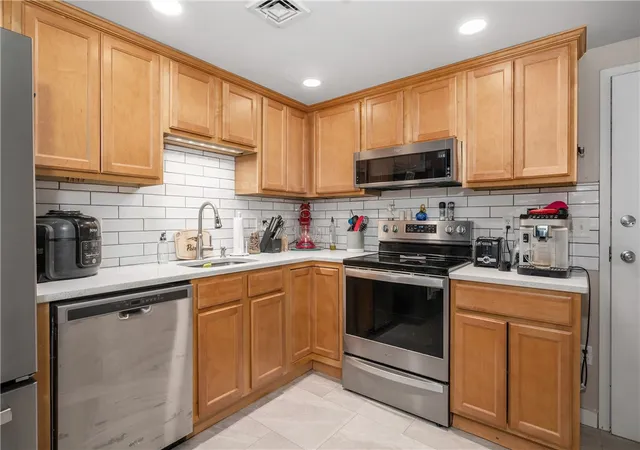 Photo 3 of Condo for sale at 494 Woonasquatucket Ave #101, North Providence, RI 02911 | MLS# 1420261 | Listing updated on 2026-09-13