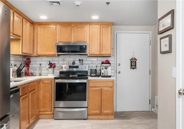 Photo 3 of Condo for sale at 494 Woonasquatucket Ave #101, North Providence, RI 02911 | MLS# 1420261 | Listing updated on 2026-10-01